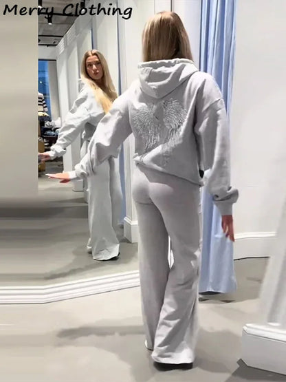 Sweat à capuche pour femme avec ailes à paillettes dans le dos