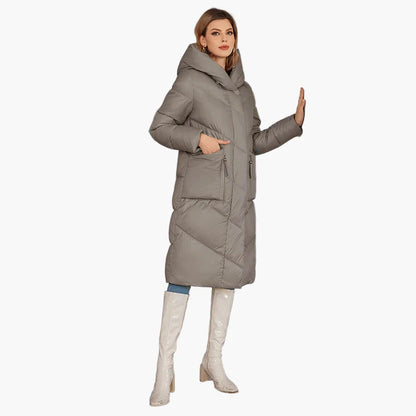Manteau d'hiver matelassé pour femme avec capuche – Manteau long tendance pour les jours froids