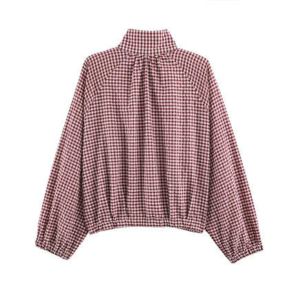 Damesblouse met ruitpatroon, hoge kraag en veterdetails – lange mouwen