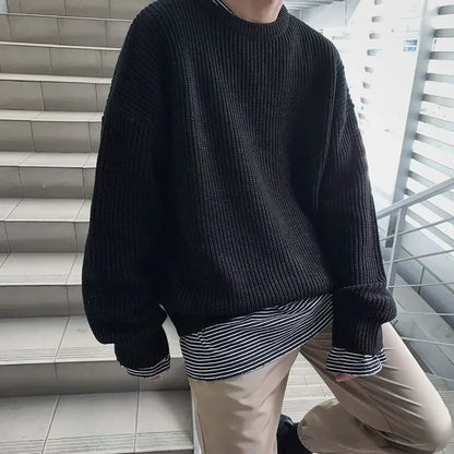 Unisex oversized strikkegenser med rund hals i ribbestrikk
