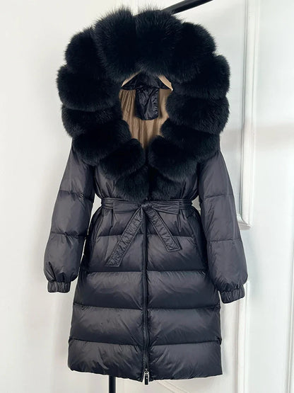 Manteau matelassé long pour femme avec capuche en fausse fourrure et ceinture, noir
