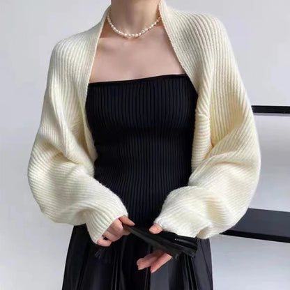 Ribstrikket bolero med lange ærmer