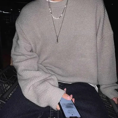 Unisex oversized strikkegenser med rund hals i ribbestrikk