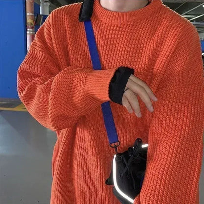 Unisex oversized strikkegenser med rund hals i ribbestrikk