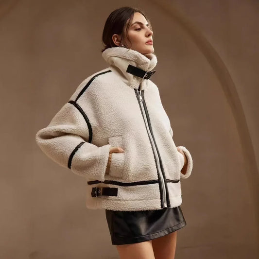 Beige women's teddy-fleece jacket with zip, stand-up collar and buckles