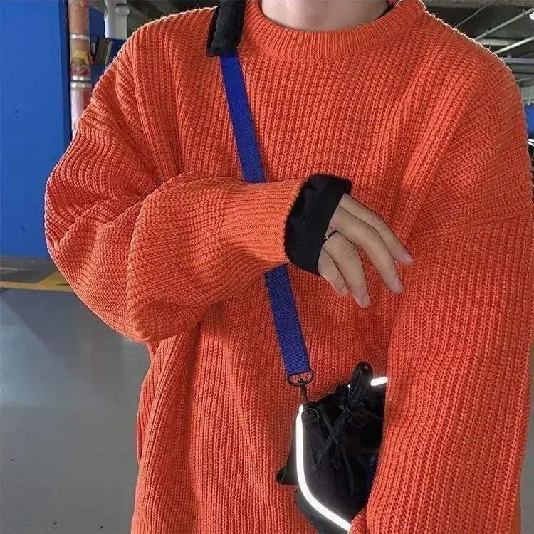 Unisex oversized strikkegenser med rund hals i ribbestrikk