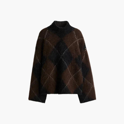 Damski oversize sweter w kratę na stylowe jesienne i zimowe stylizacje