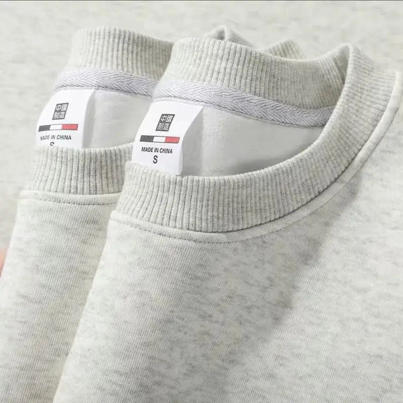 Unisex Rundhals-Sweatshirt mit Rippbündchen und weichem Innenfutter