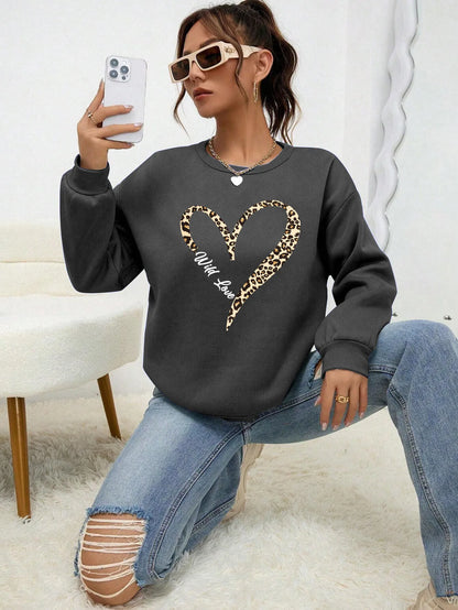 Sweat-shirt bleu pour femme avec imprimé cœur léopard, col rond et manches longues