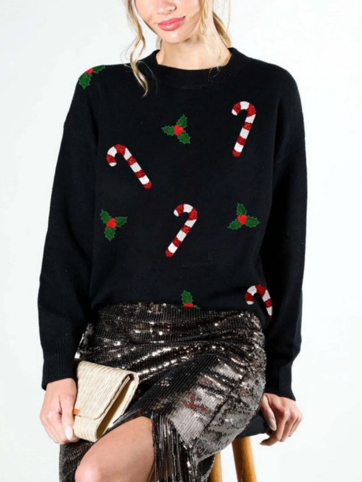 Pullover verde con motivi natalizi, scollo rotondo