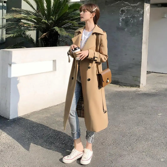 Trench-coat long femme croisé avec ceinture et manches à boucles