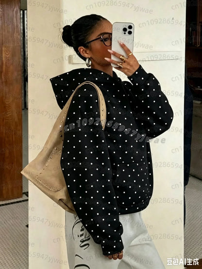 Hættetrøje til damer med camouflage-mønster, oversize-model med hætte og kængurulomme
