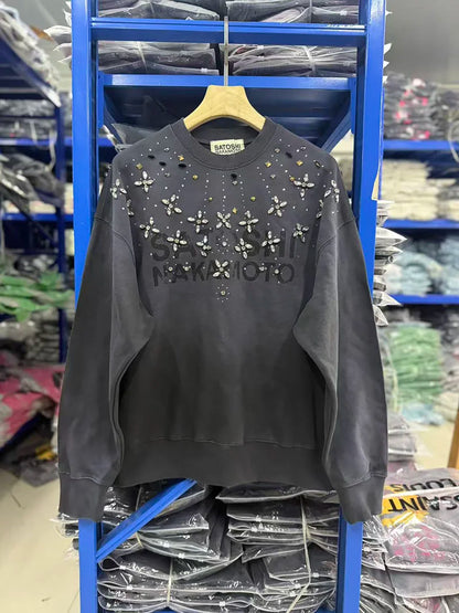 Sweatshirt med farveforløb og pyntesten - rund hals og lange ærmer