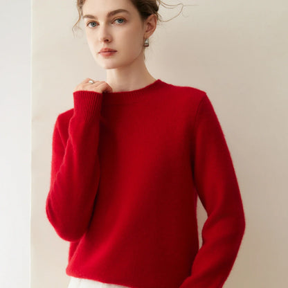 Damesweater med rund hals, lange ærmer, blødt materiale og ensfarvet design