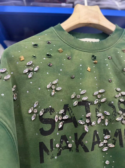 Sweatshirt med farveforløb og pyntesten - rund hals og lange ærmer