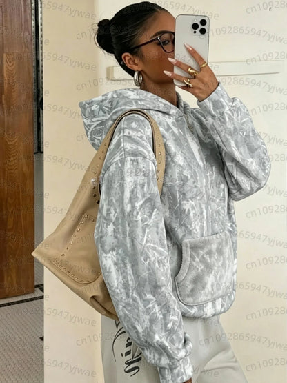 Hættetrøje til damer med camouflage-mønster, oversize-model med hætte og kængurulomme