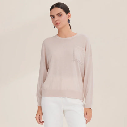 Maglia da donna a maniche lunghe con scollo rotondo e taschino sul petto, bianca