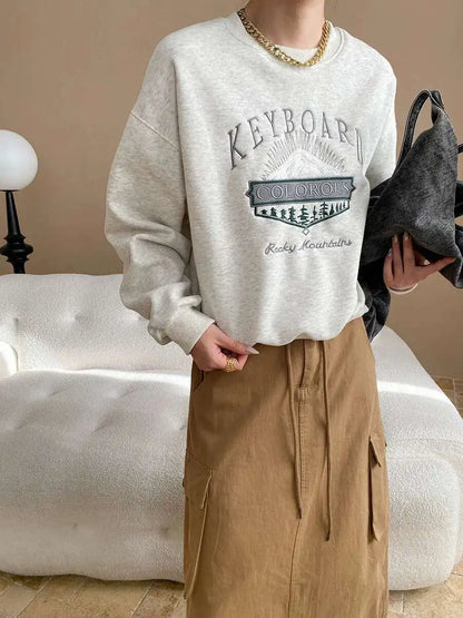 Unisex Langarm Sweatshirt mit Rundhalsausschnitt und Stickerei