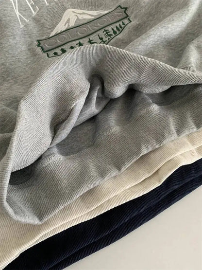 Unisex Langarm Sweatshirt mit Rundhalsausschnitt und Stickerei