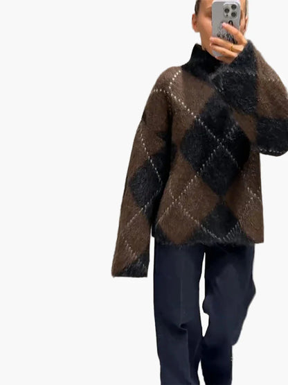 Damski oversize sweter w kratę na stylowe jesienne i zimowe stylizacje