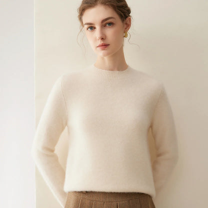 Damesweater med rund hals, lange ærmer, blødt materiale og ensfarvet design