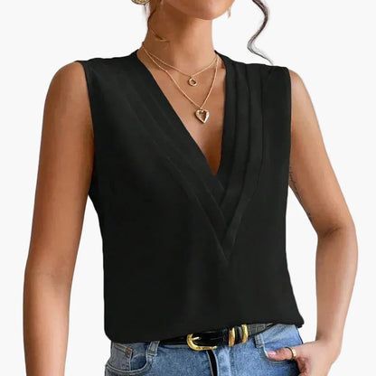 Blusa elegante senza maniche da donna con design a pieghe per ufficio e tutti i giorni