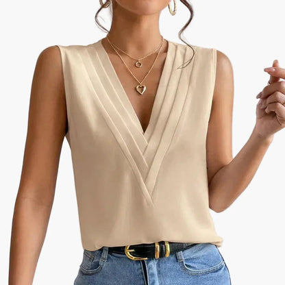 Blusa elegante senza maniche da donna con design a pieghe per ufficio e tutti i giorni