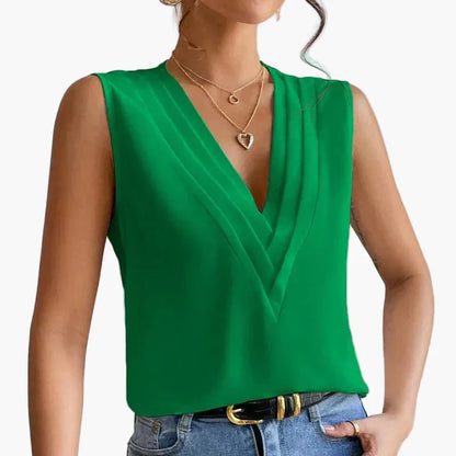 Blusa elegante senza maniche da donna con design a pieghe per ufficio e tutti i giorni