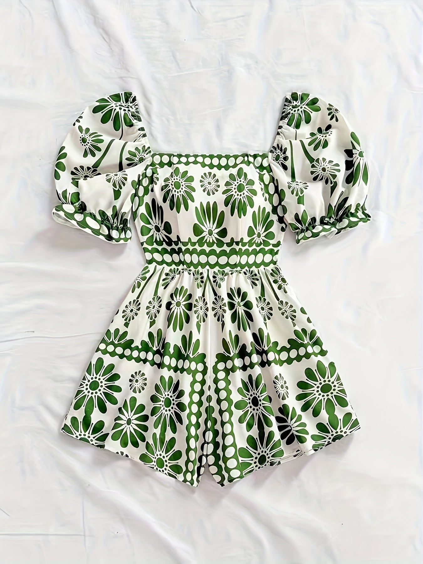 Dame vintage-jumpsuit med pufærmer og blomsterprint – Elegant heldragt til sommer og fritid