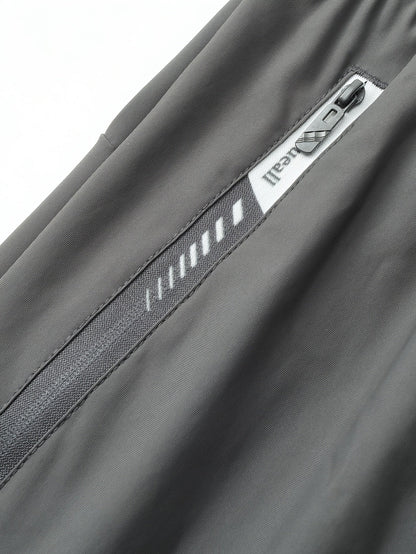 Męskie spodnie dresowe Regular Fit – letni styl casual, luźne z kieszeniami i sznurkiem w pasie