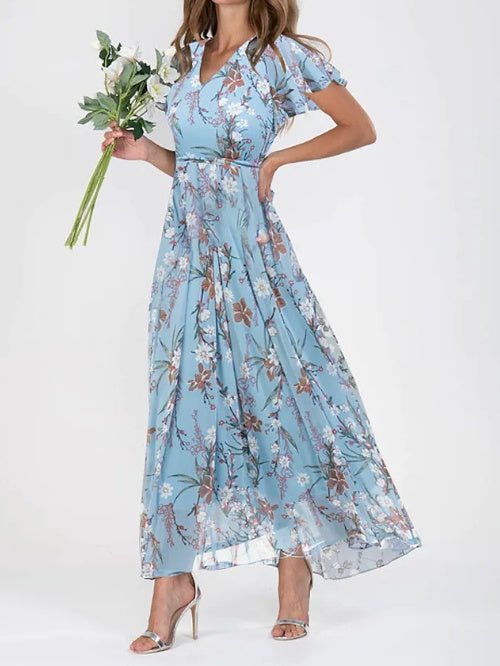 Judith – Modieuze print jurk met taille