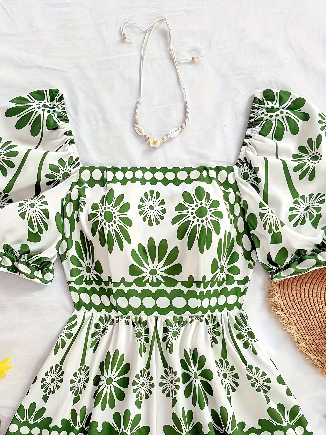 Dame vintage-jumpsuit med pufærmer og blomsterprint – Elegant heldragt til sommer og fritid