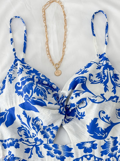 Robe midi d'été pour femme avec motif floral et découpe, tendance et féminine, idéale pour les loisirs et les vacances