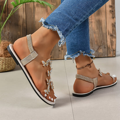 Dames sandalen met vlinderversiering en strass – platte zomerschoenen voor vrije tijd en vakantie