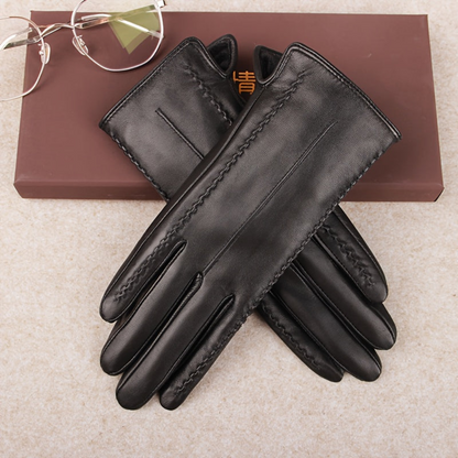 Schwarze Handschuhe mit Ziernähten