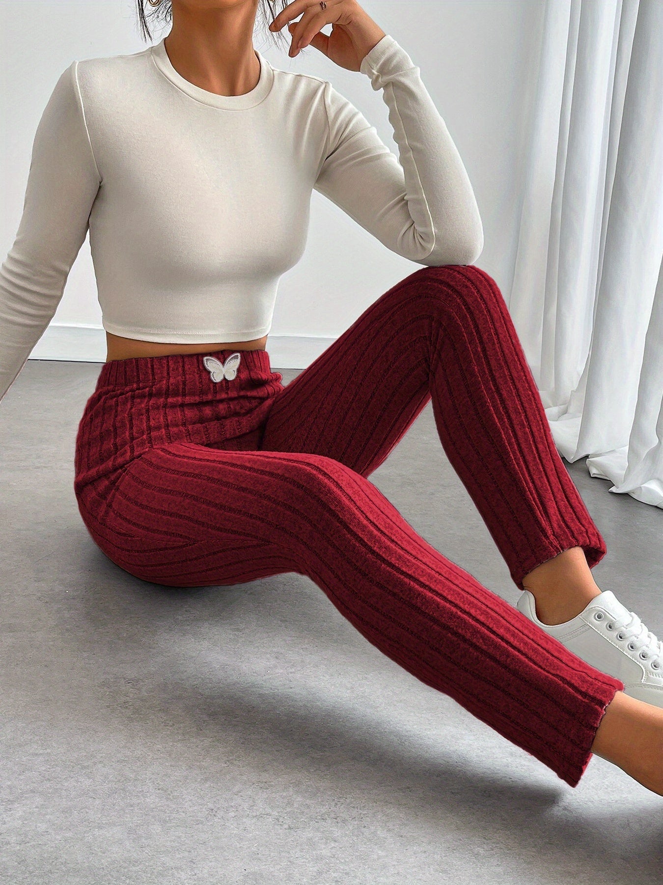 Leggings da donna a coste con vita alta e dettaglio a farfalla