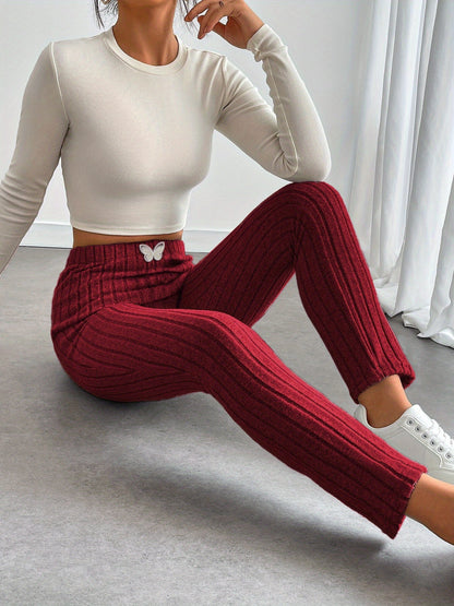 Leggings da donna a coste con vita alta e dettaglio a farfalla