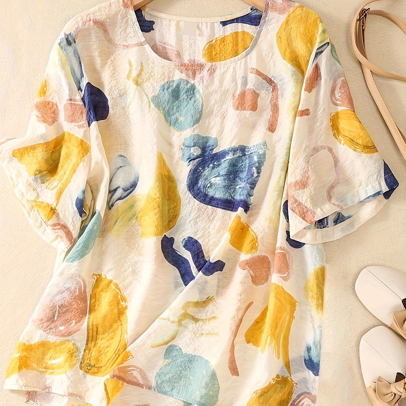 Blusa de mujer con estampado abstracto y corte holgado – Estilo artístico casual para el día a día