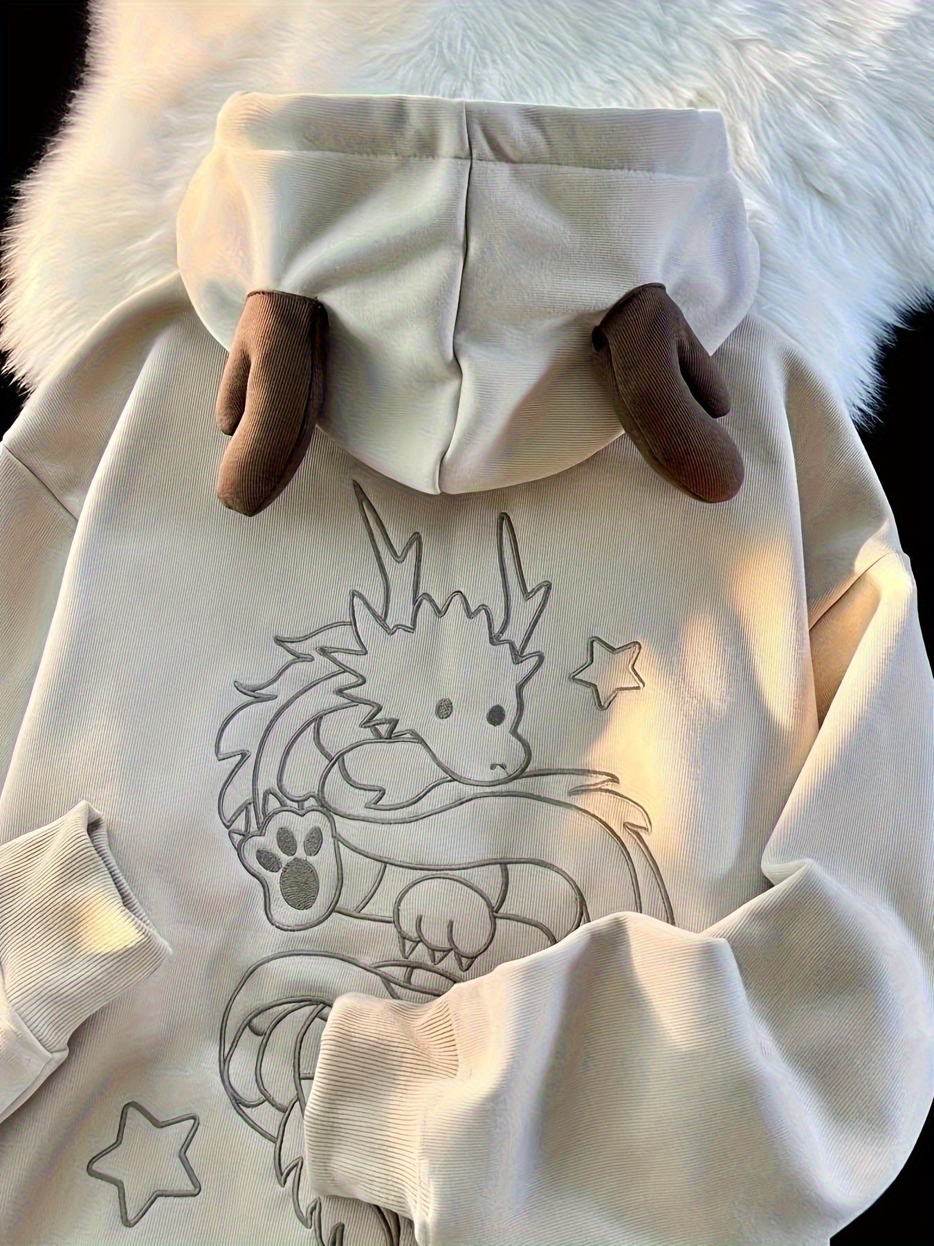 Uniseks hoodie met ritssluiting en capuchon, drakenborduursel en rendiergeweiën
