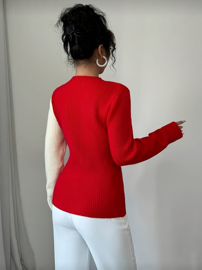 Pullover in maglia bicolore con motivo a cuori e collo alto da donna