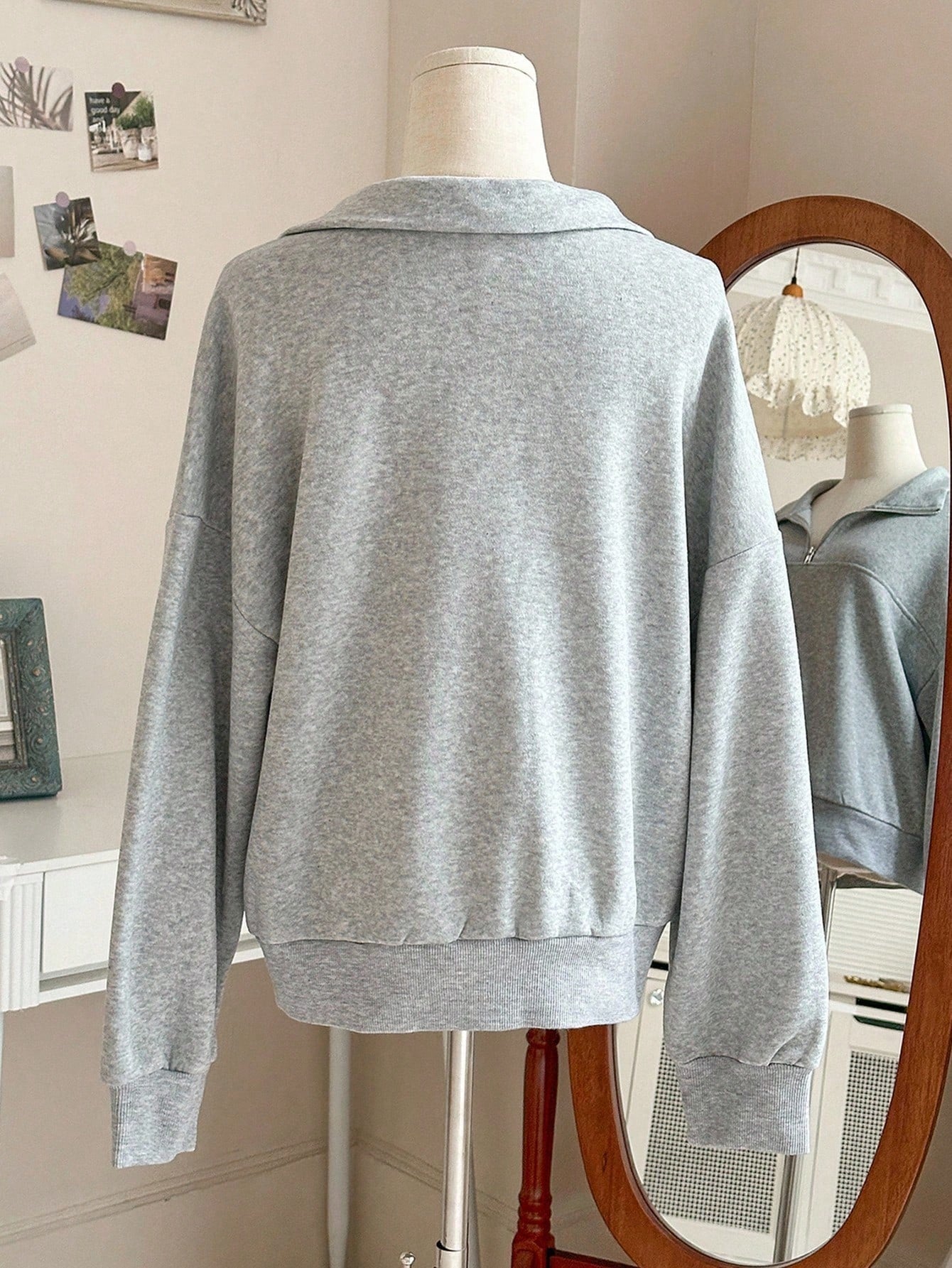 Grijze sweater met ritskraag