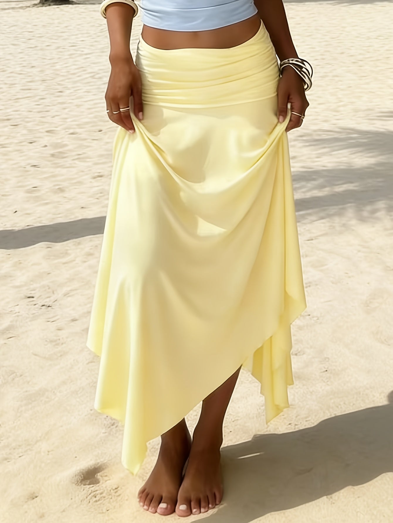 Jupe longue femme plage asymétrique coupe mouchoir mode resort