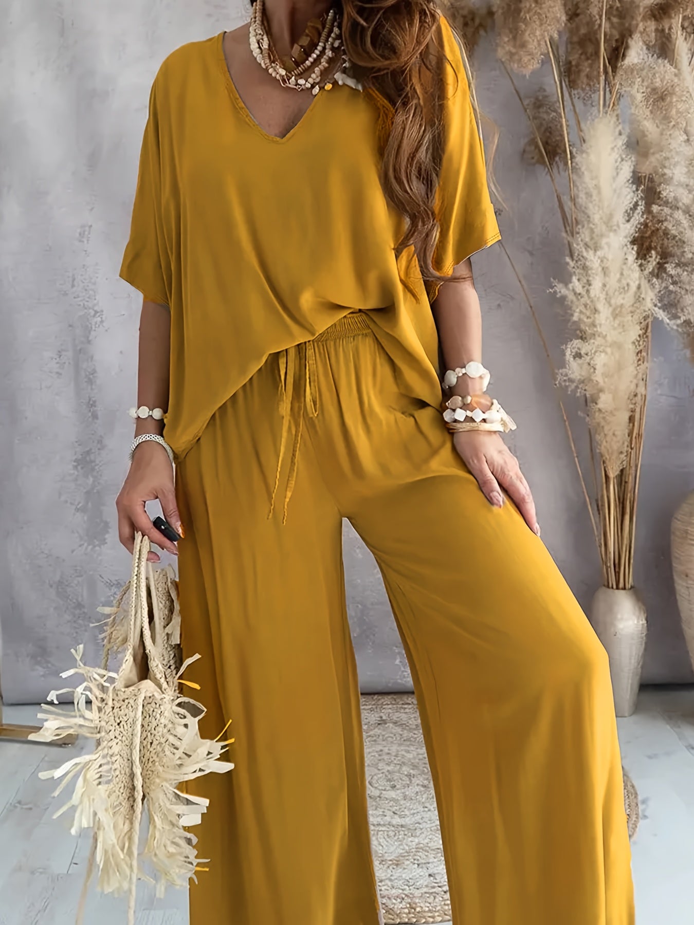 Damen Jumpsuit mit weitem Bein und V-Ausschnitt – Eleganter Freizeit Overall für Frühling und Sommer