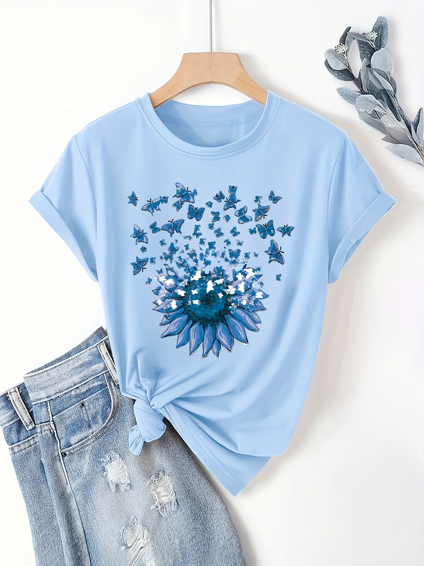 Dame T-shirt med solsikke og sommerfugle – Løs fritidstrøje med sommermotiv