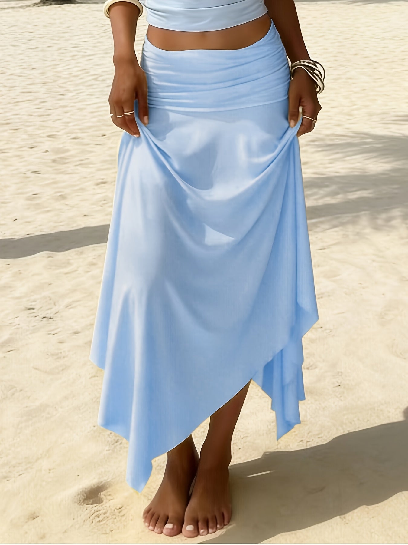 Jupe longue femme plage asymétrique coupe mouchoir mode resort