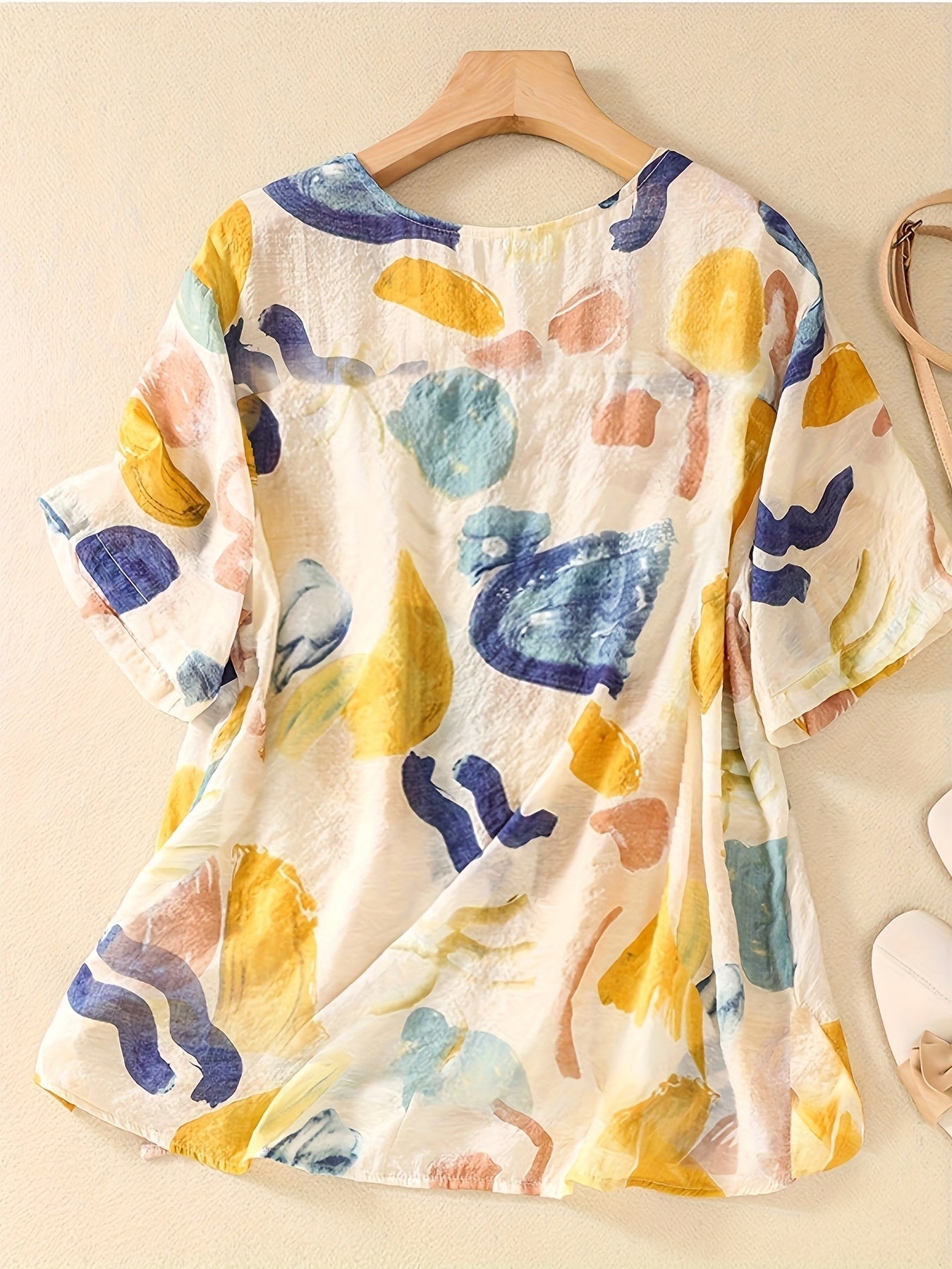 Blusa de mujer con estampado abstracto y corte holgado – Estilo artístico casual para el día a día