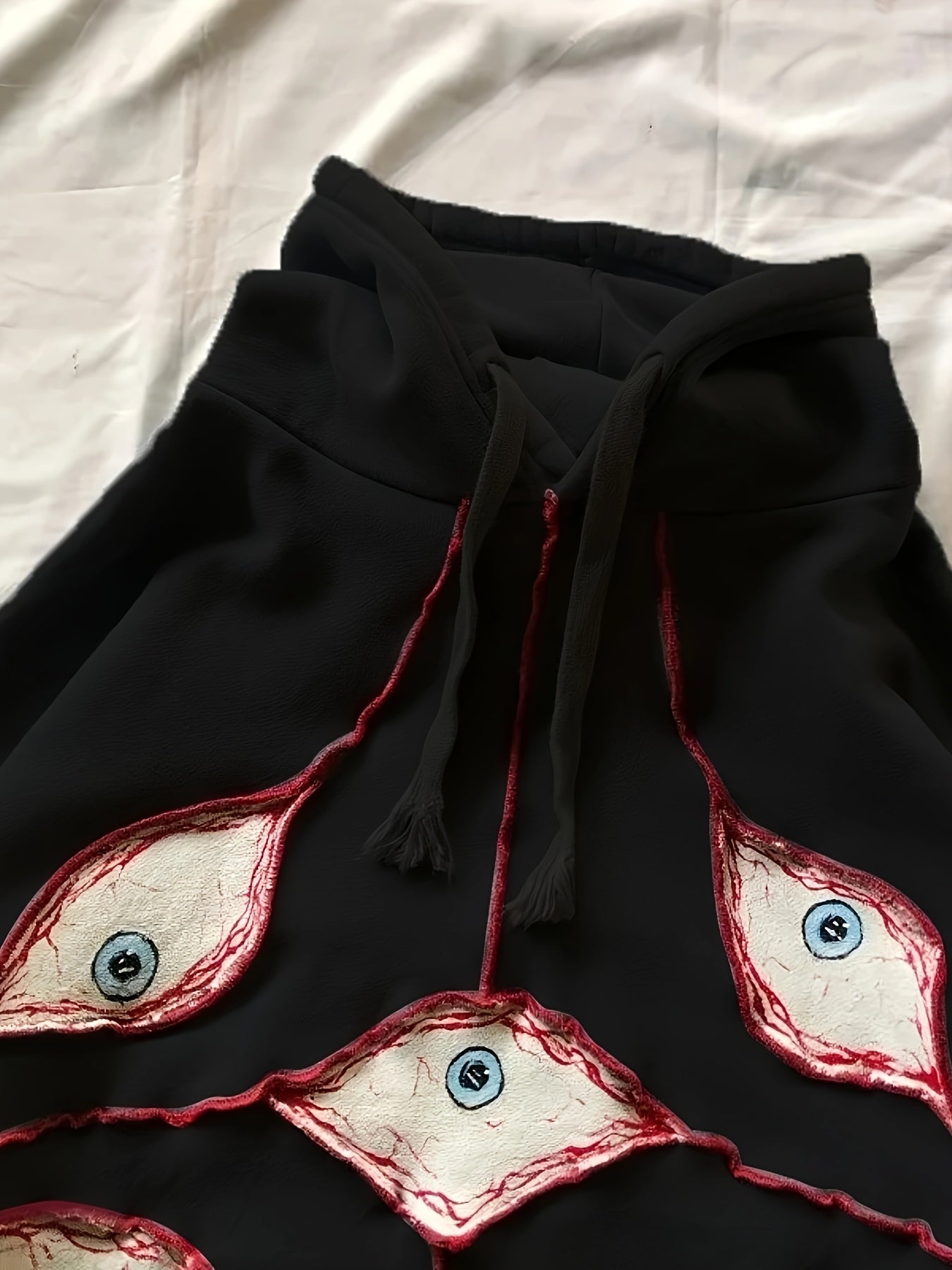 Felpa con cappuccio, taglio oversize e motivo occhi, grigio scuro