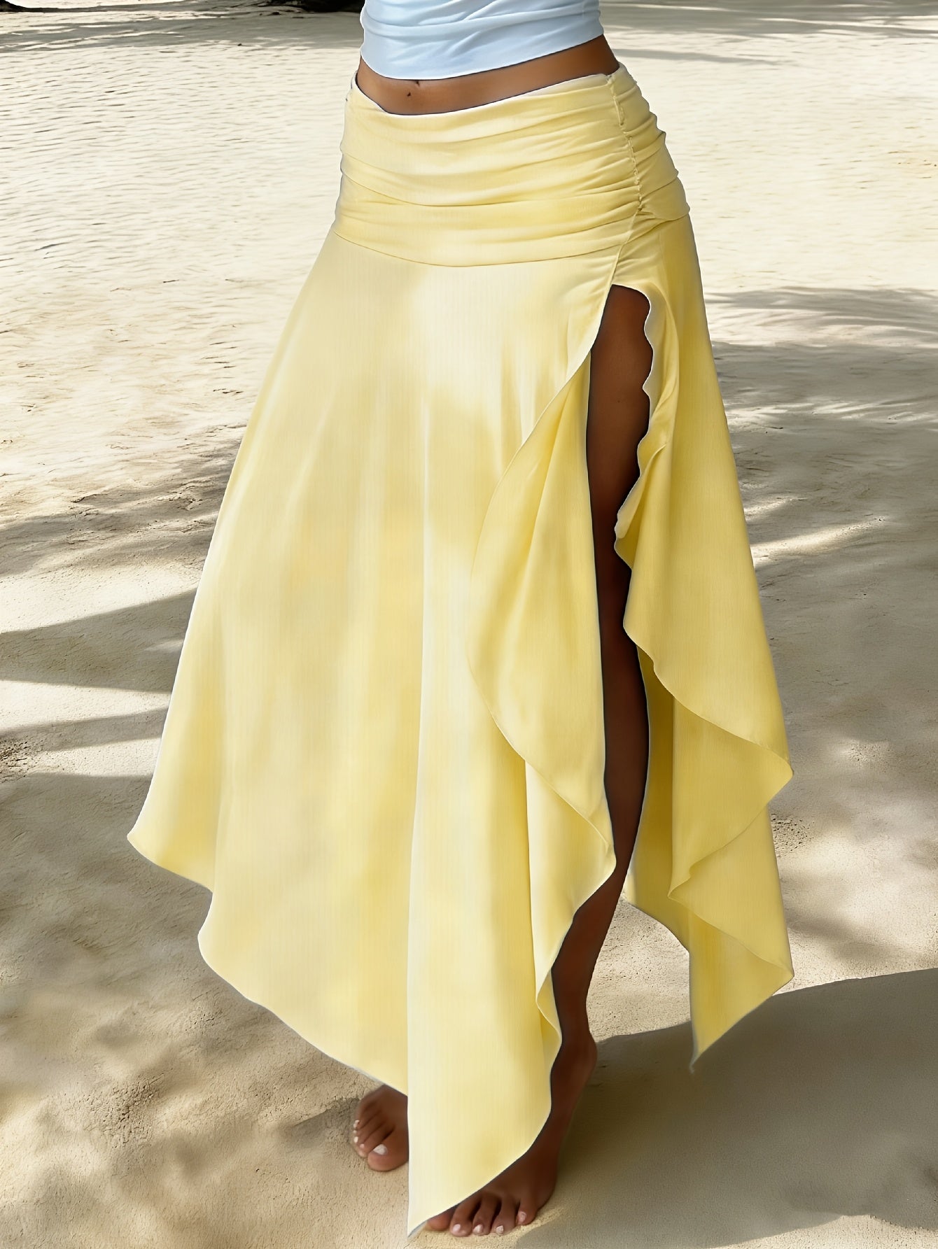 Jupe longue femme plage asymétrique coupe mouchoir mode resort