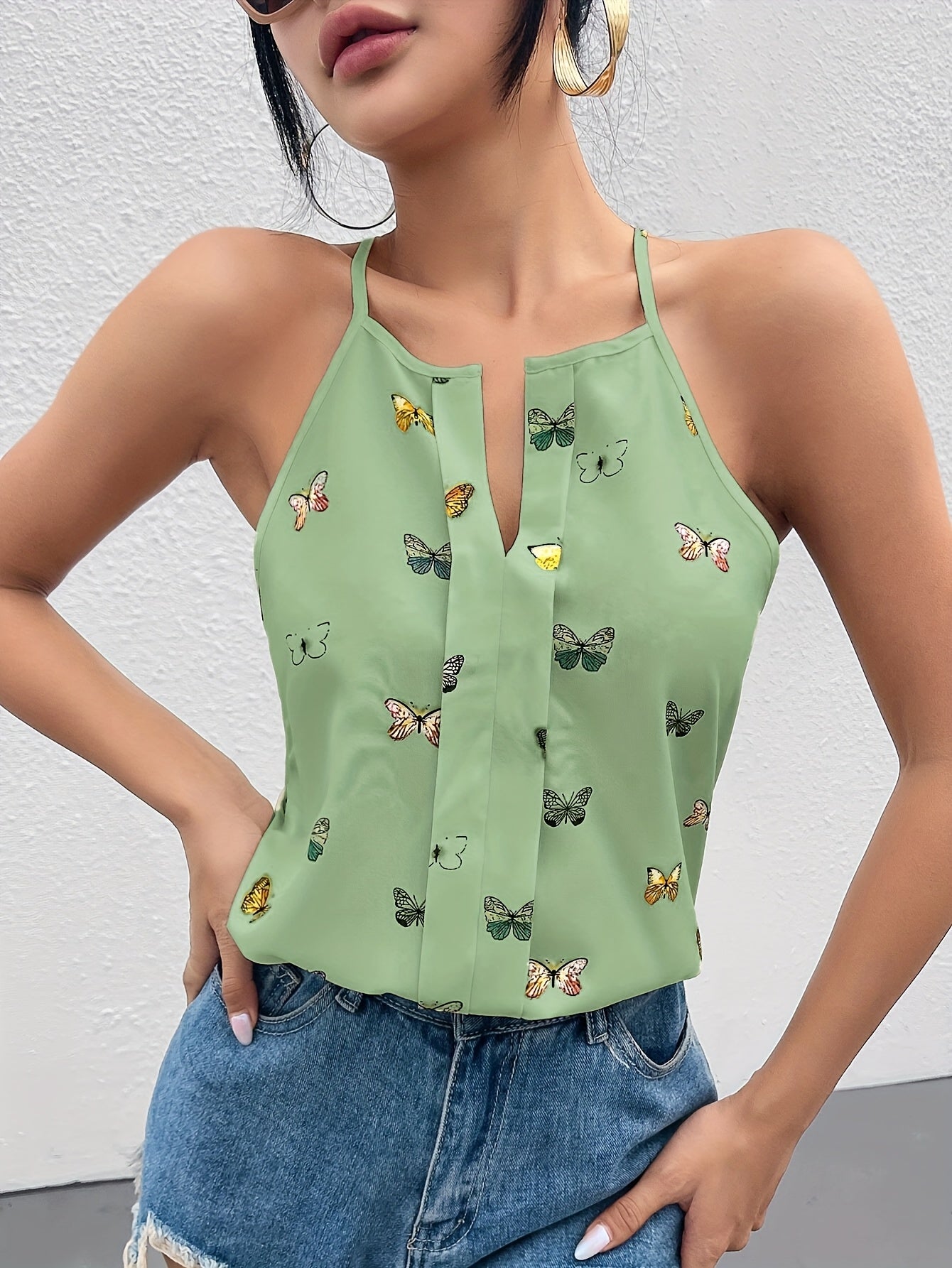 Dame singlet med sommerfuglmønster – Elegant sommertopp for fritid og hverdag