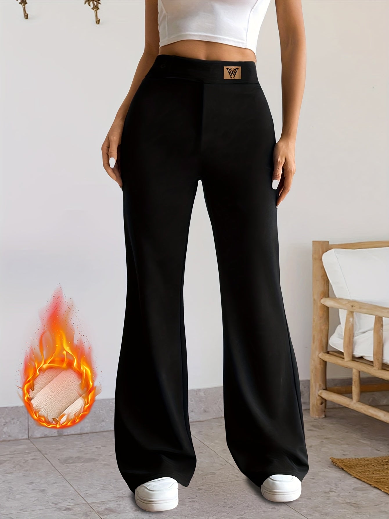 Pantaloni termici da donna a zampa, neri, con fodera calda, gamba svasata e vita alta